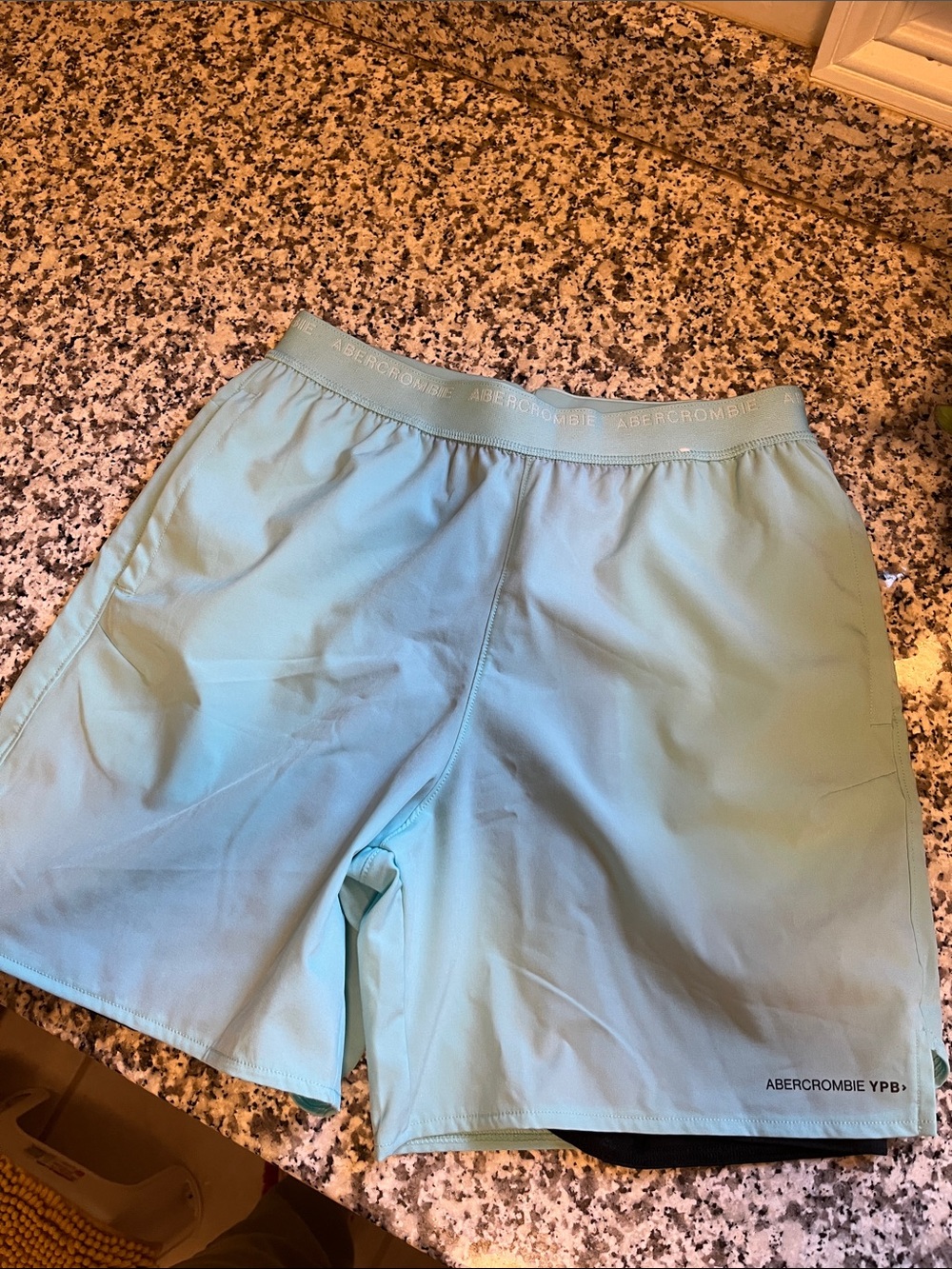 Abercrombie kids YPB Motiontek twofer shorts in bright light blue size 13/14